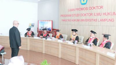 Promovendus Topan Berhasil Sandang Gelar Doktor Ilmu Hukum Unila