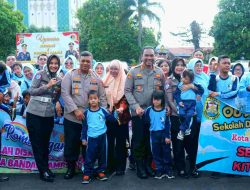 Kapolresta – Kadisdikbud Bergembira Bersama Puluhan Siswa SDB Bandar Lampung