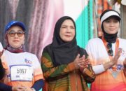 Wali Kota Eva Dwiana Lepas Bank Lampung Run 2026 di Tugu Adipura